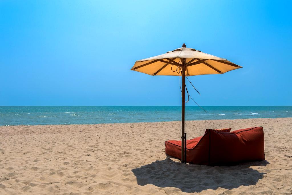 Peaceful view of travelers communicating in a cozy travel lounge