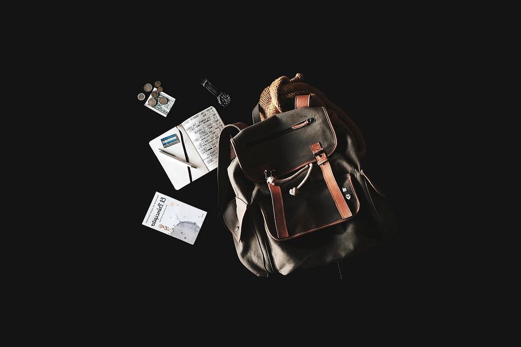 Traveler with backpack enjoying a view at a scenic overlook