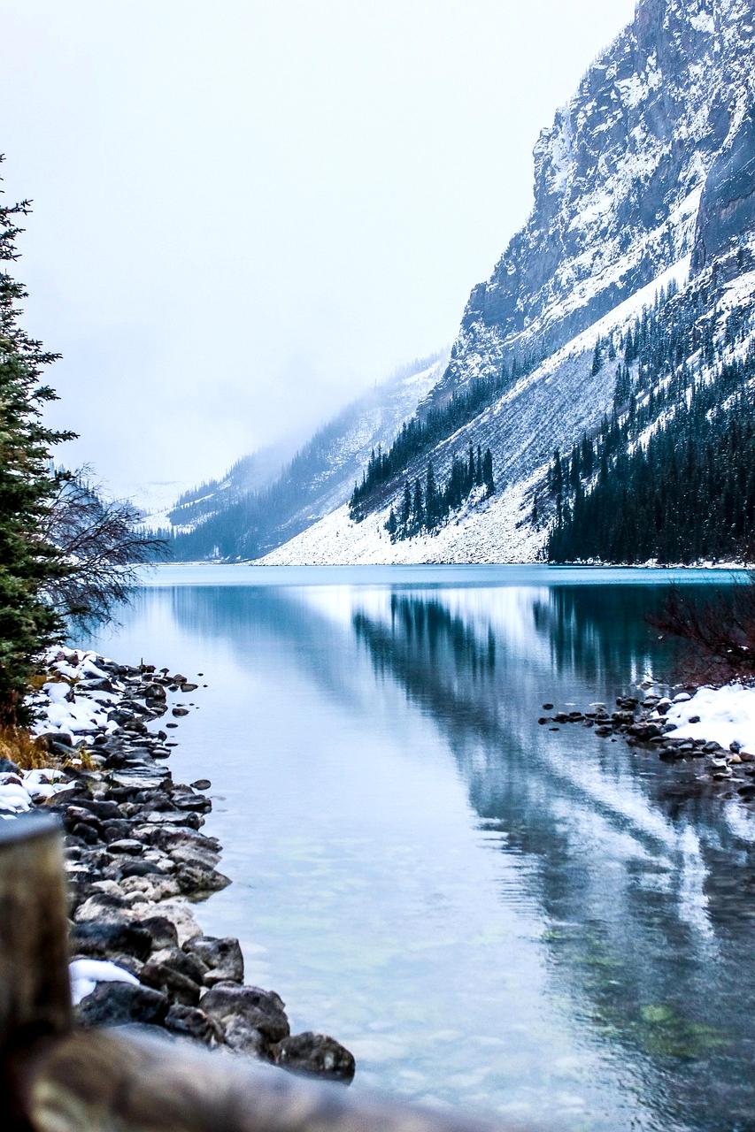 Traveler on a mountain trail during golden hour